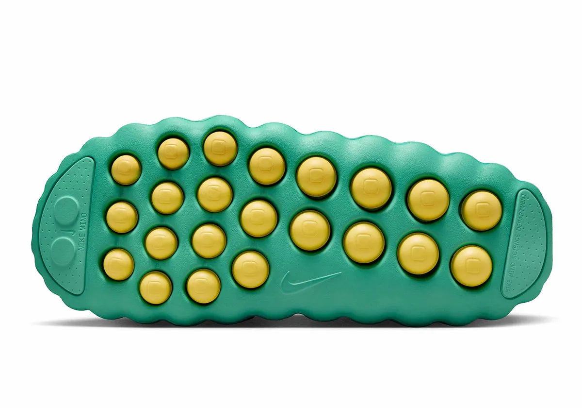 Claquette Nike Mind 001 Slide Geode Teal Light Menta en mousse technique avec pods sensoriels et design futuriste sculpté.