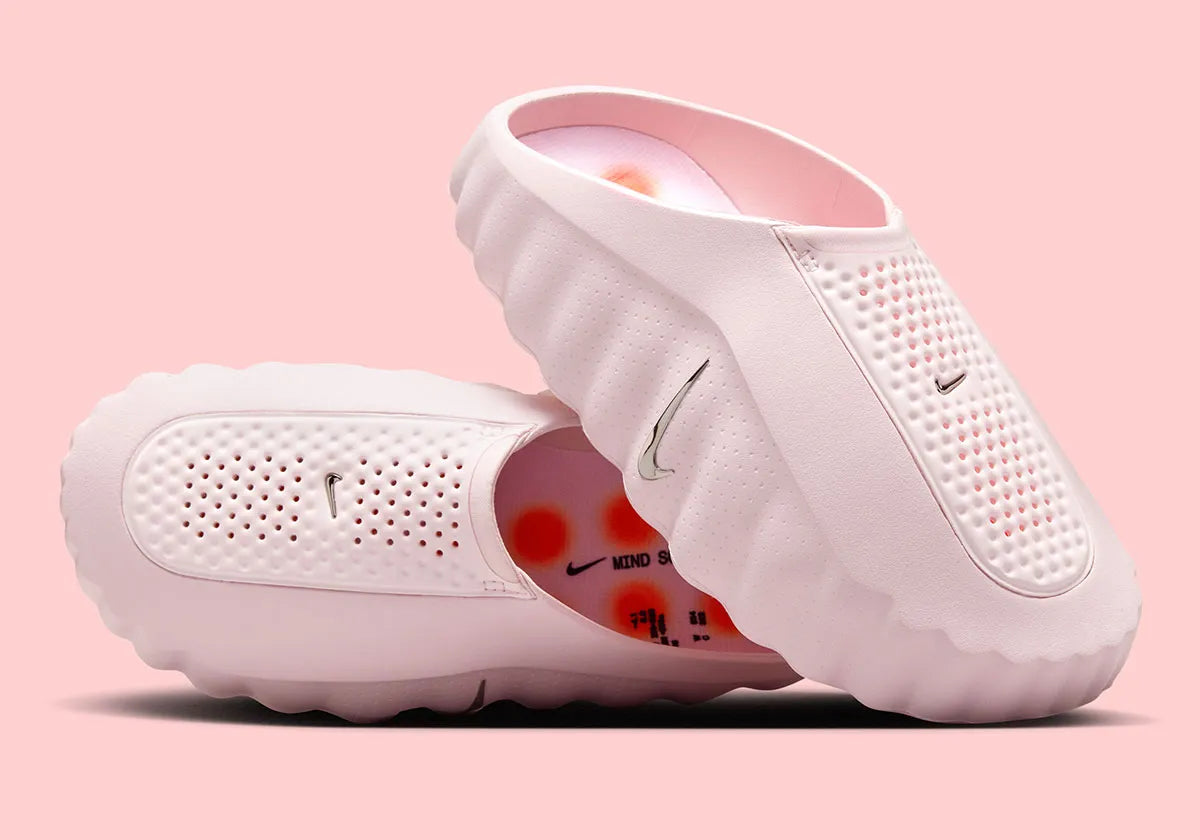 Claquette Nike Mind 001 Slide Pearl Pink rose nacré en mousse technique avec pods sensoriels et design sculpté moderne.