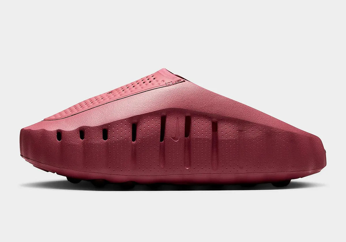 Nike Mind 001 Pink Smoke Mystic Dates HQ4309-601 avec empeigne en maille perforée rose fumé, détails Metallic Silver et semelle sensorielle à 22 points de pression.
