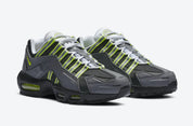 Nike Air Max 95 NDSTRKT Neon CZ3591-002, sneaker noire et grise avec détails jaune Neon, cage TPU et unités Nike Air visibles.