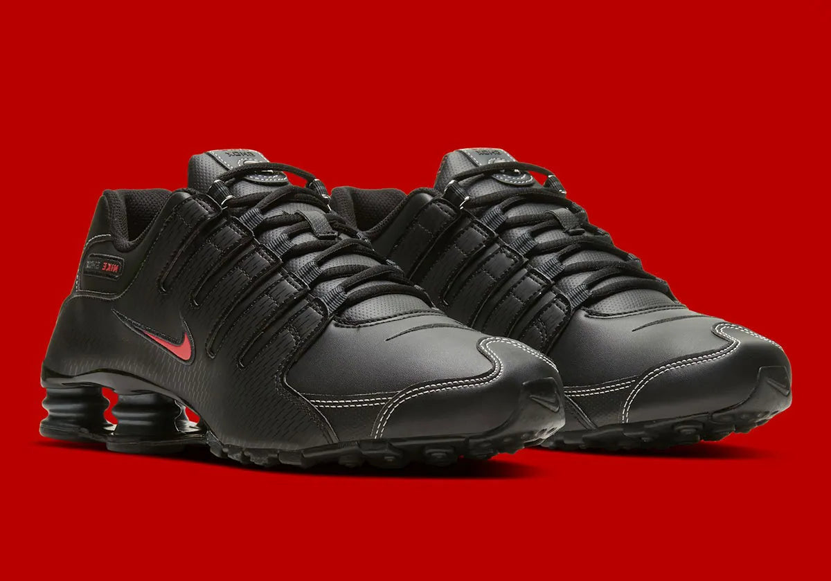 Nike Shox NZ Black Varsity Red noires avec détails rouge Varsity Red et amorti Nike Shox.