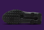 Nike Shox R4 Cave Purple Black noires avec détails violet Cave Purple et amorti Nike Shox.