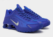 Nike Shox R4 Racer Blue Metallic Silver – sneakers premium rétro-futuristes pour lifestyle et running, vue de face 3/4