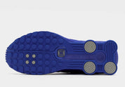 Nike Shox R4 Racer Blue Metallic Silver – sneakers premium rétro-futuristes pour lifestyle et running, vue du bas