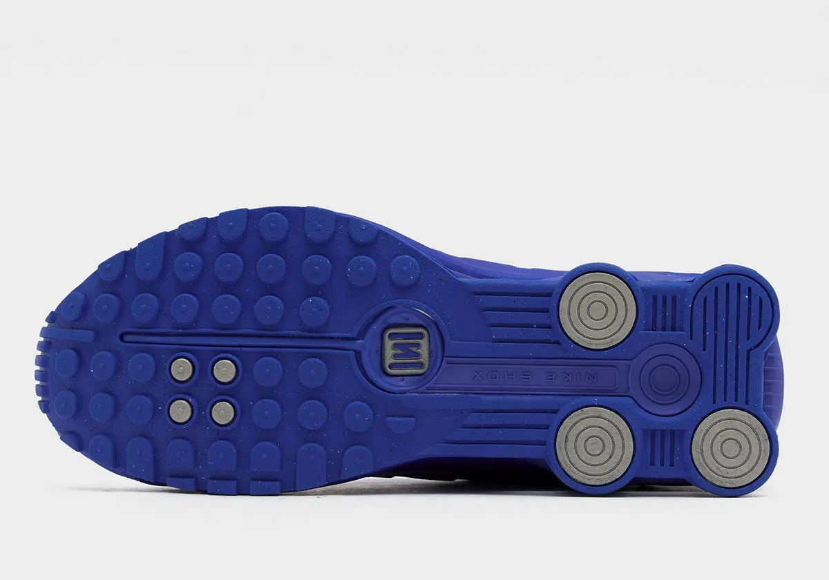 Nike Shox R4 Racer Blue Metallic Silver – sneakers premium rétro-futuristes pour lifestyle et running, vue du bas