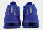 Nike Shox R4 Racer Blue Metallic Silver – sneakers premium rétro-futuristes pour lifestyle et running, vue de dos