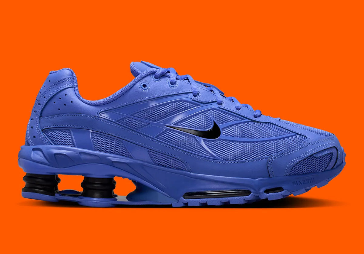 Nike Shox Ride 2 Sapphire Black noires avec détails bleu Sapphire et amorti Nike Shox.