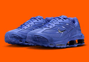 Nike Shox Ride 2 Sapphire Black noires avec détails bleu Sapphire et amorti Nike Shox.