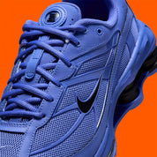 Nike Shox Ride 2 Sapphire Black noires avec détails bleu Sapphire et amorti Nike Shox.