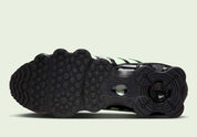 Nike Shox TL Vapor Green Black noires avec détails vert Vapor Green et amorti Nike Shox sur toute la longueur.