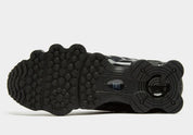 Nike Shox TL Black Celestine Blue noires avec détails bleu Celestine Blue et amorti Nike Shox sur toute la longueur.