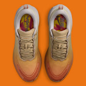 Nike Vomero Plus SP Cheat Day, sneaker Nike au design running technique avec semelle épaisse, amorti généreux et Swoosh latéral.
