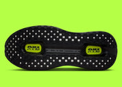 Sneakers Nike Vomero Premium en Black et Volt avec mesh respirant et amorti Zoom Air premium.