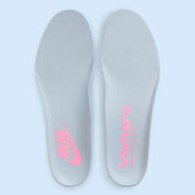 Sneakers Nike Vomero Premium femme en Blue Tint avec mesh respirant et amorti Zoom Air premium.