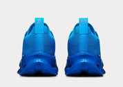 sneakers premium On Running Cloudtilt LOEWE bleu électrique en mesh technique avec semelle CloudTec Phase et finitions haut de gamme vues de derrière. 
