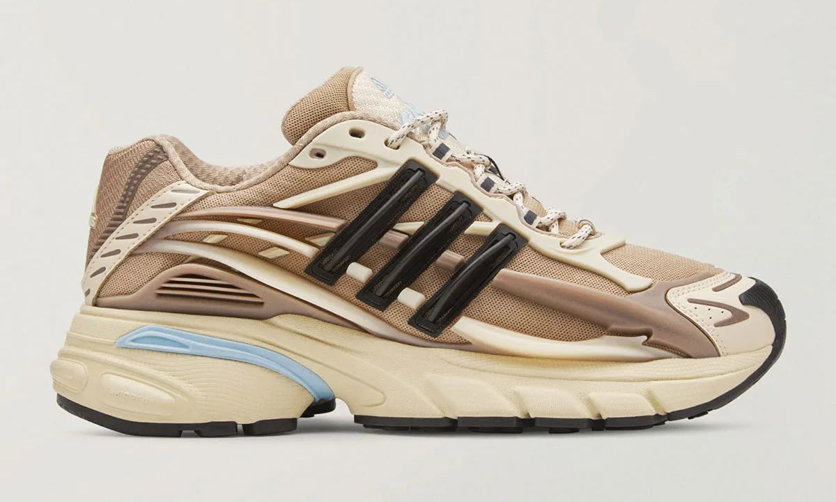 Adidas Adistar Jellyfish Pharrell Williams Crystal Sand beige et marron avec tige en mesh, cage TPU sculptée et semelle Adiprene massive.