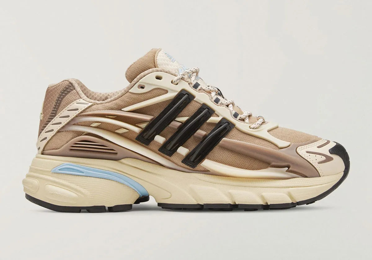 Adidas Adistar Jellyfish Pharrell Williams Crystal Sand beige et marron avec tige en mesh, cage TPU sculptée et semelle Adiprene massive.