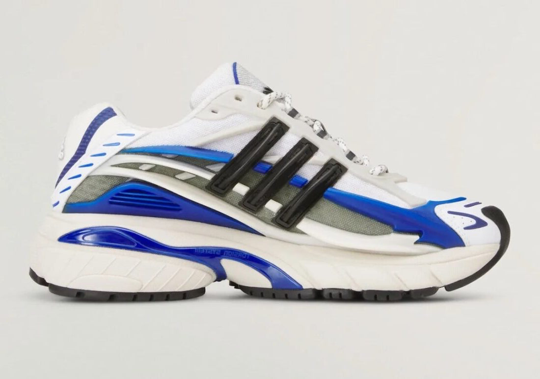 Sneakers adidas Adistar Jellyfish Pharrell Williams Royal Blue en matériaux techniques premium avec design sculptural futuriste et semelle amortissante vue de profil intérieur. 