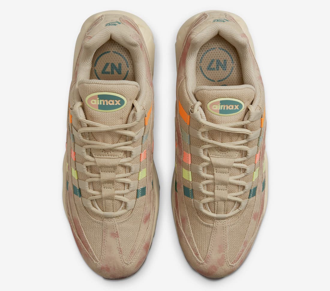 Sneakers Nike Air Max 95 N7 2022 en mesh et matières premium avec accents rouges et turquoise et amorti Air Max visible. Vue du dessus 