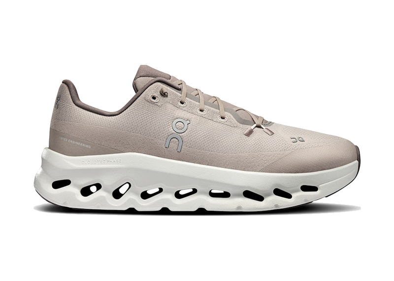 On Running Cloudtilt Cinder Fog, sneaker lifestyle grise équipée des technologies CloudTec Phase® et Helion™ offrant un amorti performant et un confort optimal.