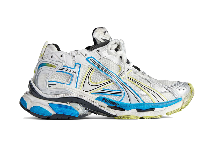 Balenciaga Runner White Yellow Blue avec tige en mesh respirant, empiècements en cuir blanc, jaune et bleu, semelle intermédiaire en mousse et silhouette inspirée du running vintage.