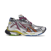 Balenciaga Runner Multicolor avec tige en mesh respirant, empiècements en cuir et matières synthétiques multicolores, silhouette running déstructurée et semelle épaisse en caoutchouc.