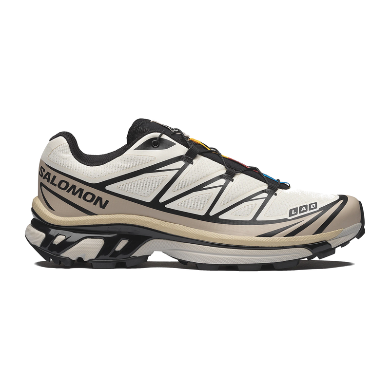 Salomon XT-6 Vanilla Ice Black Silver Cloud avec tige en mesh respirant, renforts en TPU, système Quicklace™, technologie ACS et semelle Contagrip®.
