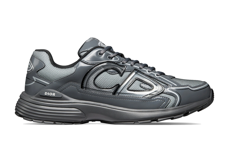 Dior B30 Light Gray Gray avec tige en mesh respirant, empiècements en cuir et matières techniques gris clair et gris, silhouette running moderne et semelle en caoutchouc.