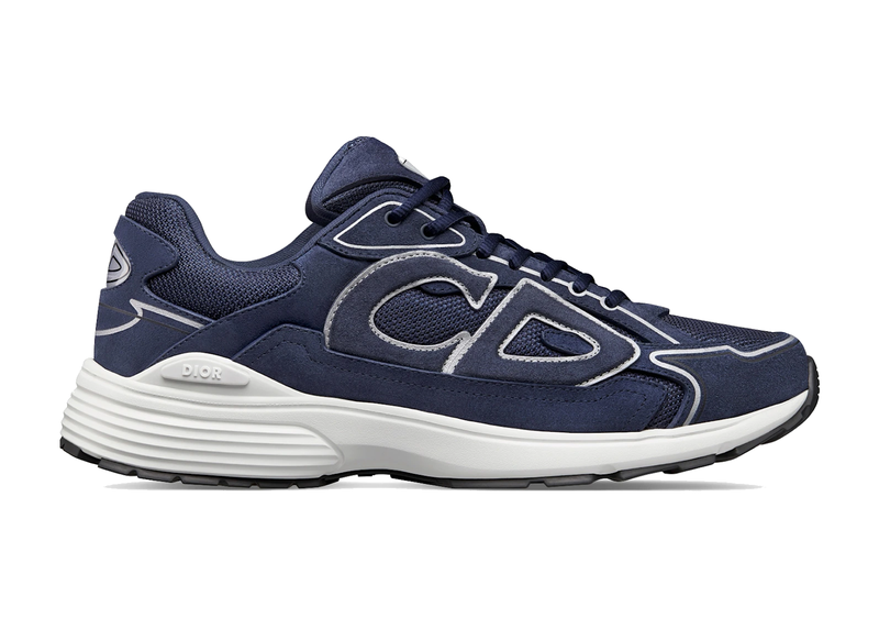Dior B30 Navy Blue Suede avec tige en mesh respirant, empiècements en daim bleu marine et matières techniques, silhouette running moderne et semelle en caoutchouc.