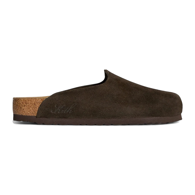 Sabot Birkenstock Amsterdam Kith Mocca en suède brun premium avec semelle anatomique en liège et design minimaliste confortable.