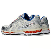 ASICS Gel-Kayano 12.1 Ronnie Fieg Knicks en mesh bleu, orange et blanc avec amorti GEL, détails premium et design rétro-running collector.