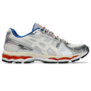 ASICS Gel-Kayano 12.1 Ronnie Fieg Knicks en mesh bleu, orange et blanc avec amorti GEL, détails premium et design rétro-running collector.