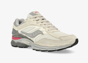 Saucony ProGrid Omni 9 Premium Ivory Grey Pink en mesh ivoire avec détails gris et roses, amorti ProGrid vue de 3/4 face. 