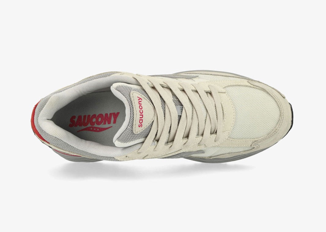 Saucony ProGrid Omni 9 Premium Ivory Grey Pink en mesh ivoire avec détails gris et roses, amorti ProGrid vue du dessus. 