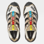 Salomon XT-4 OG Black Desert Tan L49217100 en noir avec détails beige Desert Tan et Vanilla Ice, semelle technique et châssis Agile Chassis™.