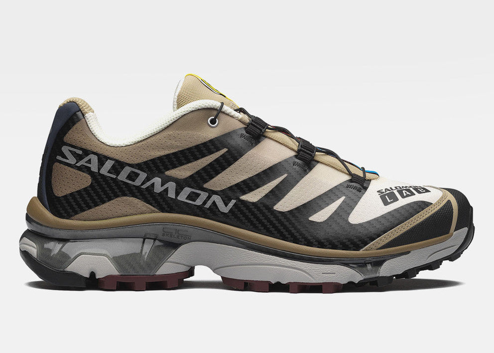 Salomon XT-4 OG Black Desert Tan L49217100 en noir avec détails beige Desert Tan et Vanilla Ice, semelle technique et châssis Agile Chassis™.