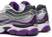 Saucony ProGrid Omni 9 White Black Silver Purple en mesh blanc avec détails argentés, noirs et violets, amorti ProGrid vue de profil. 
