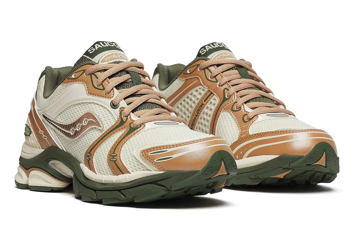 Sneakers Saucony ProGrid Triumph 4 Saucony & Friends Seanella Abraham en mesh respirant, avec empiècements synthétiques premium, palette pastel artistique et amorti ProGrid performant.