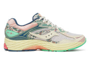 Sneaker Saucony ProGrid Omni 9 beige avec détails bleus floraux en mesh respirant et semelle amortissante ProGrid