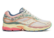 Sneaker Saucony ProGrid Omni 9 beige avec détails bleus floraux en mesh respirant et semelle amortissante ProGrid