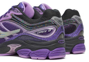 saucony progrid 9 violet et noir confortable vue de coté extérieur talon