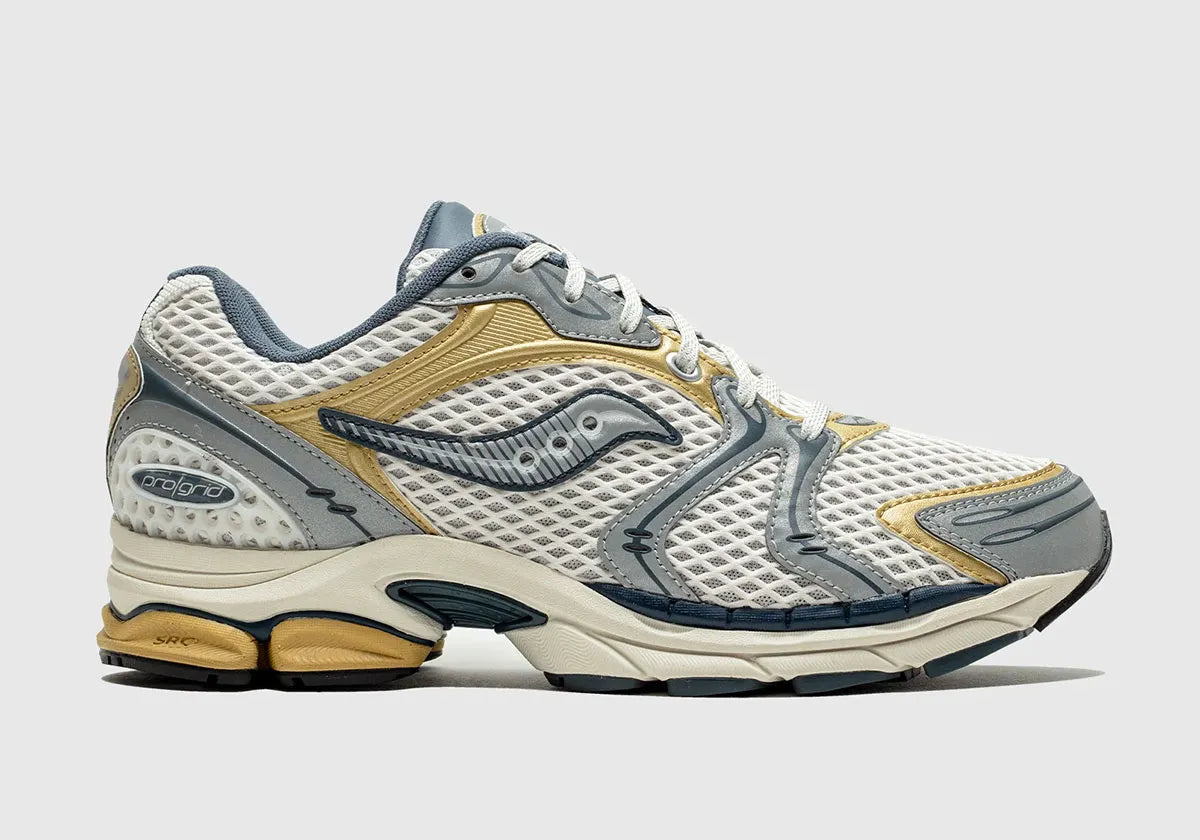 Saucony ProGrid Triumph 4 Fabricated Future, sneaker Saucony rétro-running au design technique et futuriste avec construction multicouche et amorti ProGrid.