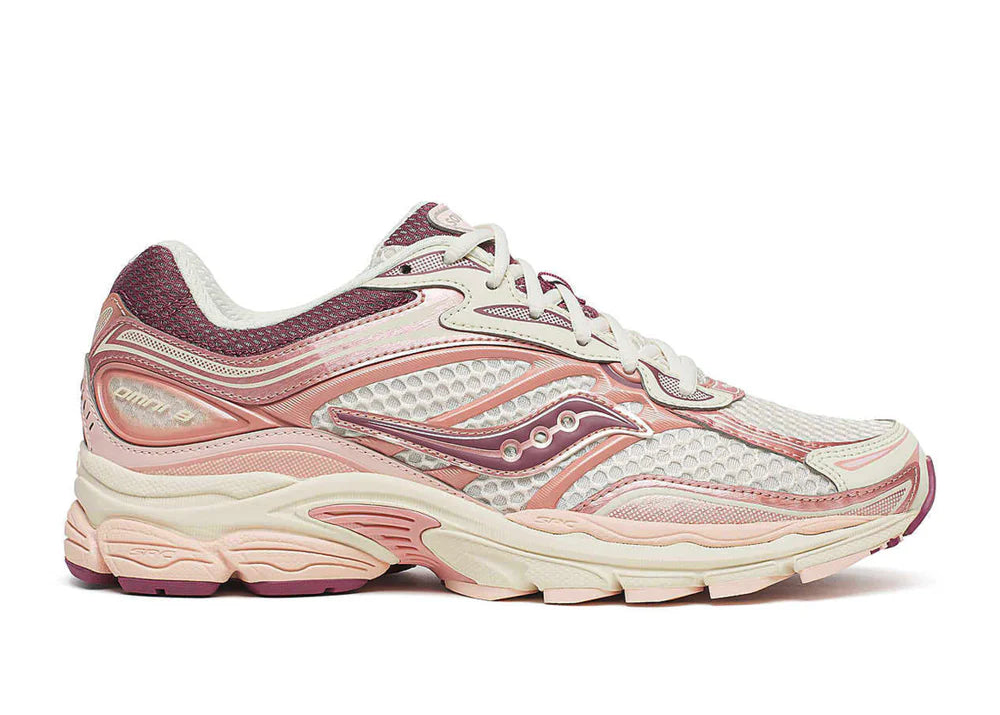 Saucony ProGrid Omni 9 Ivory Peoni en mesh ivoire avec détails rosés et amorti ProGrid vue de profil