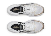 Saucony Ride Millennium blanche avec détails dorés et noirs, mesh respirant et semelle amortie GRID.Vue de haut