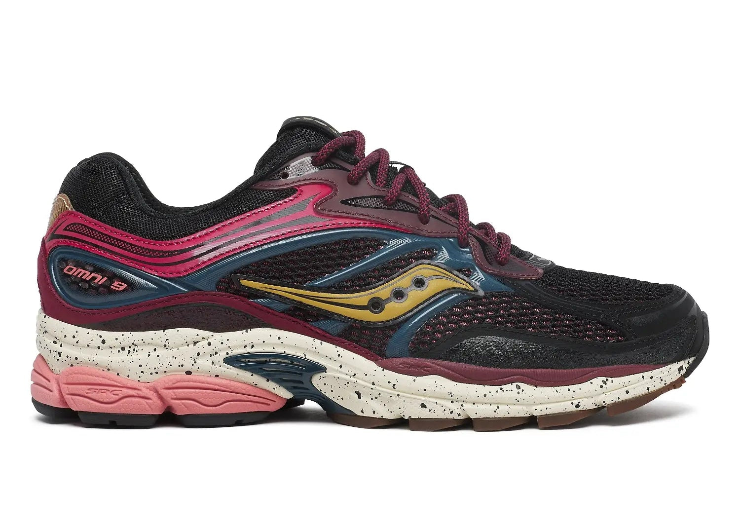 Saucony ProGrid Omni 9 Autumnal Equinox, sneaker running rétro multicolore avec mesh ouvert, accents métalliques irisés et semelle Grid vue de profil. 