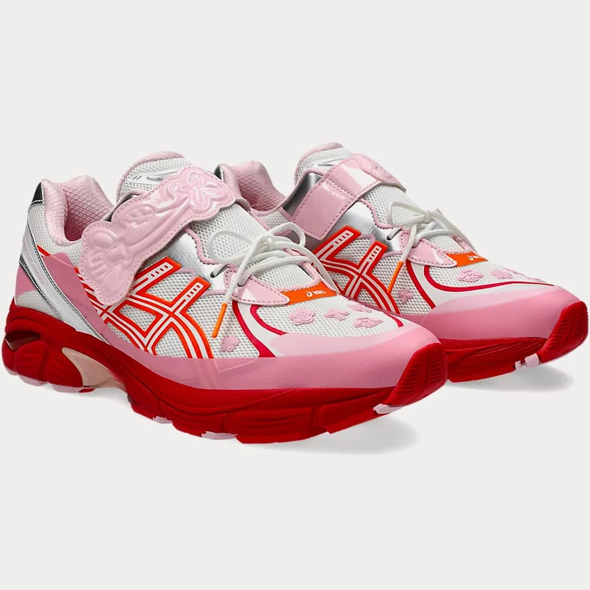 Sneaker ASICS GT-2160 Cecilie Bahnsen Habanero rouge avec mesh technique, détails floraux et amorti GEL premium.