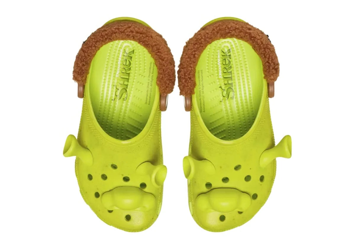Crocs Classic Clog DreamWorks Shrek inspirées de l'univers de Shrek, avec design exclusif, bride pivotante et semelle légère en résine Croslite™.
