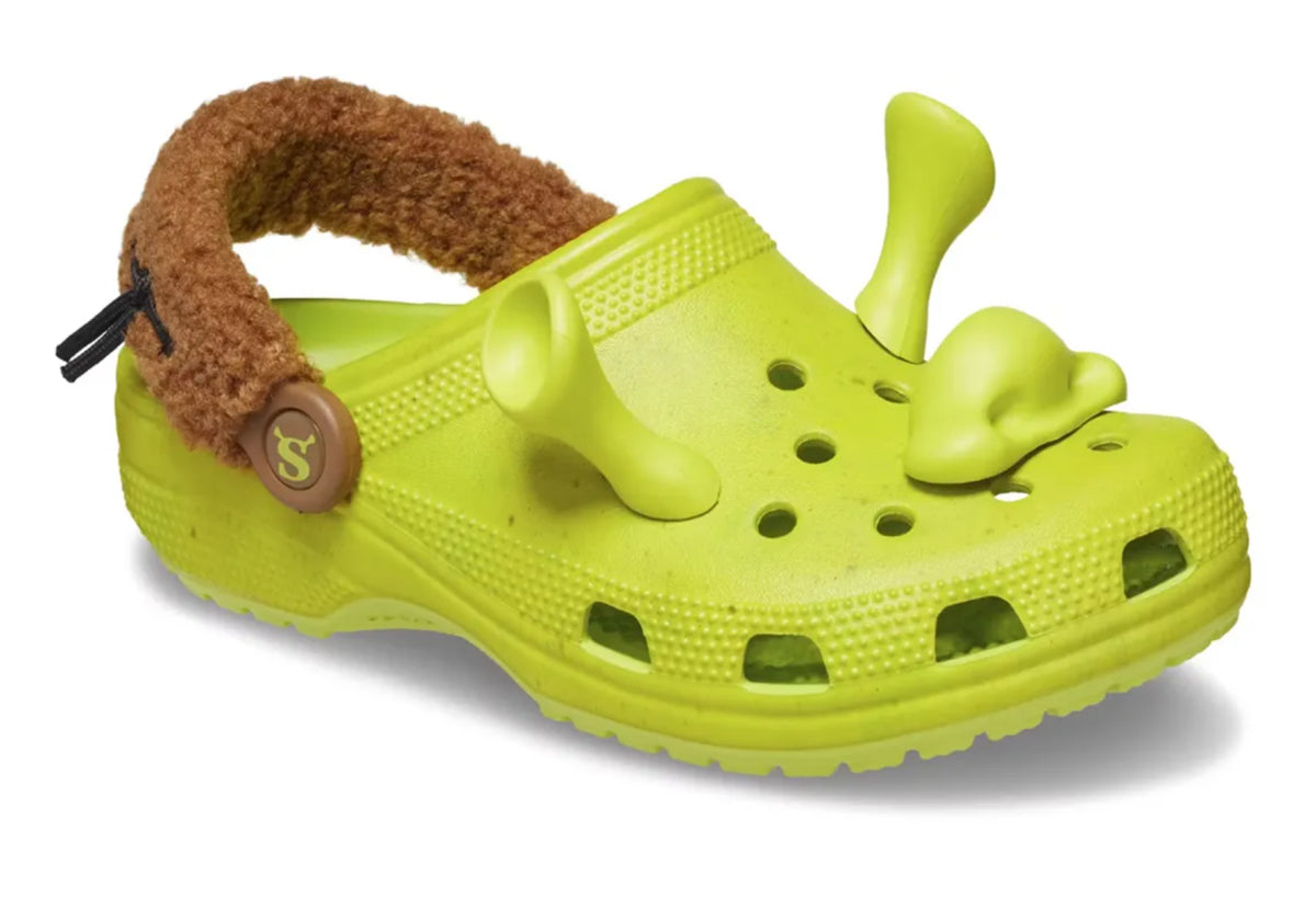 Crocs Classic Clog DreamWorks Shrek inspirées de l'univers de Shrek, avec design exclusif, bride pivotante et semelle légère en résine Croslite™.