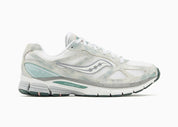 Saucony ProGrid Guide 7 Spiritual Guidance White Verde avec tige en mesh blanc, empiècements verts et cuir, technologie ProGrid et semelle extérieure en caoutchouc.