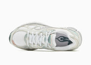 Saucony ProGrid Guide 7 Spiritual Guidance White Verde avec tige en mesh blanc, empiècements verts et cuir, technologie ProGrid et semelle extérieure en caoutchouc.